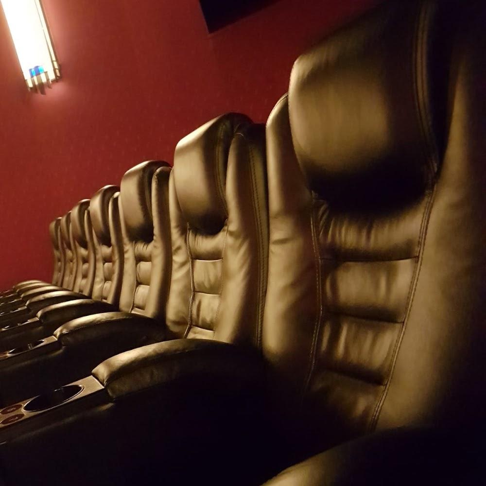 Black leather seats in a movie theater.